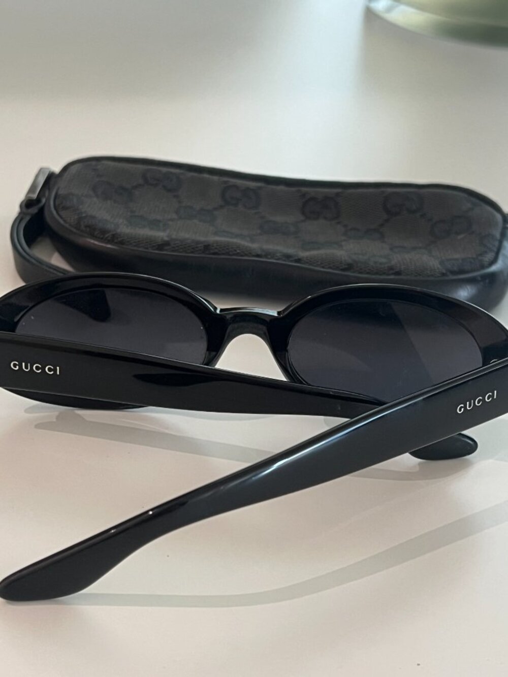 Gucci Black Oval Sunglasses
